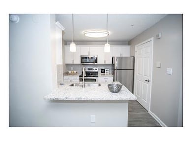 Kitchen featuring decorative light fixtures, taste