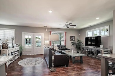 Living area featuring french doors, a wealth of na