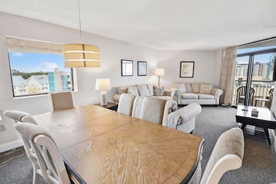 Dining room featuring carpet floors and a wealth o