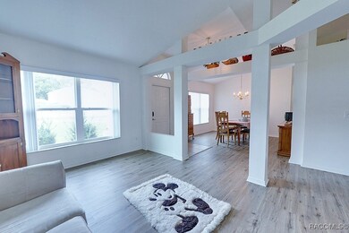 open den, front door, formal dining room
