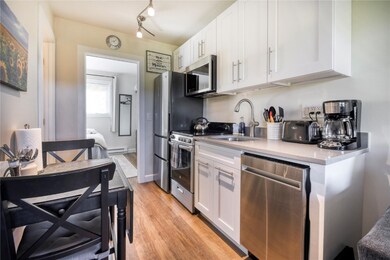 Dine in kitchen with new counters, cabinets, stain
