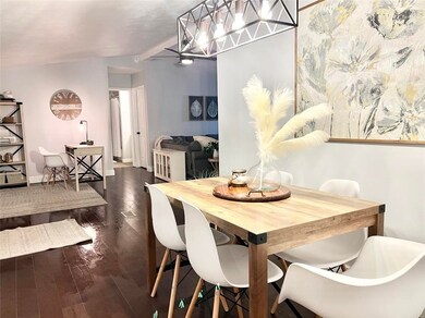 Open concept living and vaulted ceilings with mode