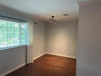 Empty room featuring a chandelier, ornamental mol