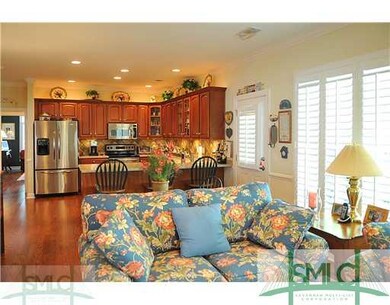 Den/Family/Great Room. The wonderful kitchen is OP