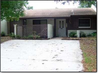 Exterior Front - Extra large driveway makes for a low maintenance front yard.