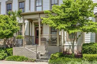 Very private porch area surrounded with beautiful flowering trees and landscaping