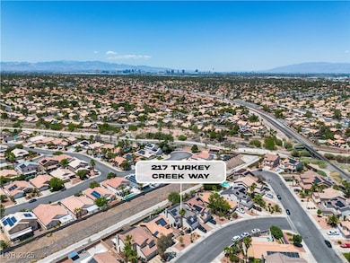 Aerial perspective of suburban area with a mountai