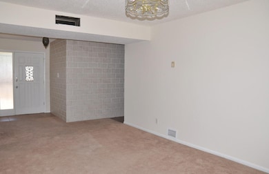 Front living area looking back to entry