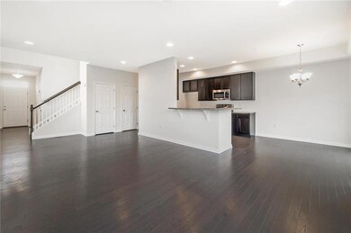 View of kitchen and dining room from living room