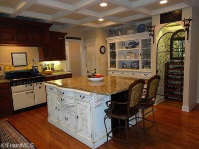Kitchen. Custom island is the center of this 