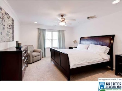 The master bedroom is spacious enough for a king s