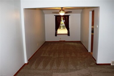Dining Room has newly installed carpet.