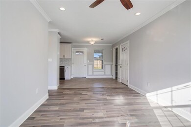 Living Room alternate view with wood tile flooring