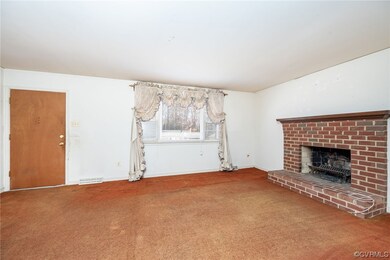 Large living room with woodburning fireplace
