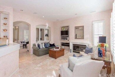 Handsome family room with fireplace, opens to kitc