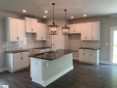 With walk-in pantry and stainless steel appliances