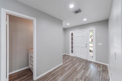 A look back at the entryway and a view of the half
