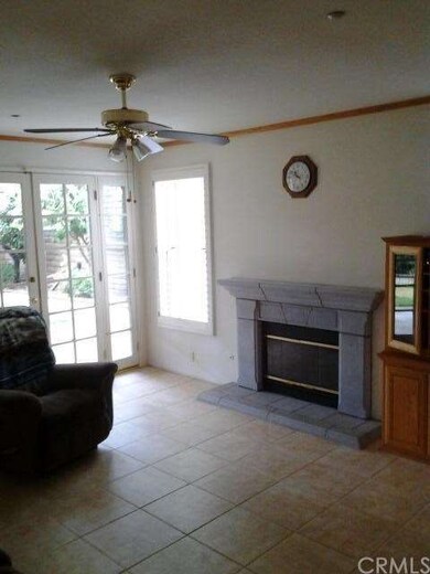 family room with fireplace and French doors