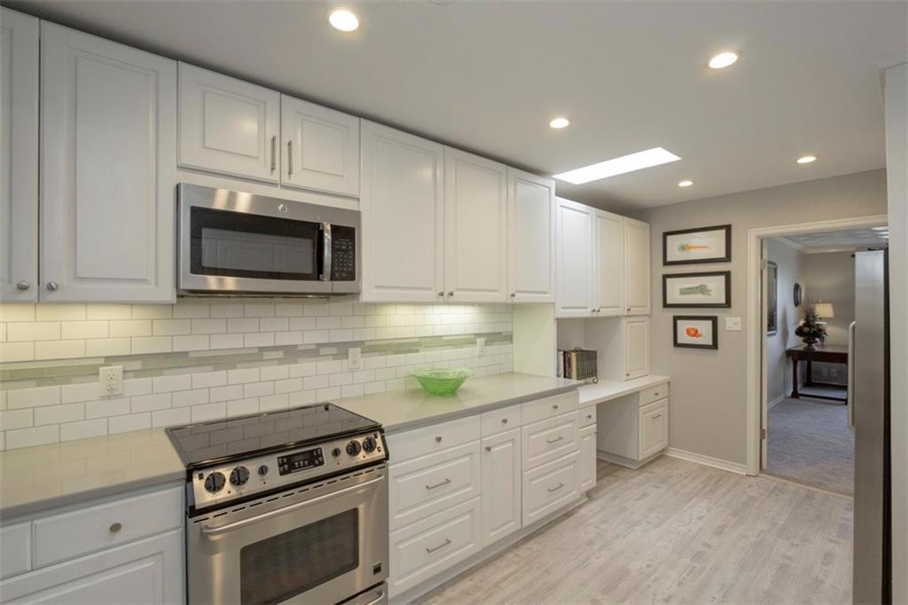 Gorgeous gourmet kitchen! Updated cabinetry, under