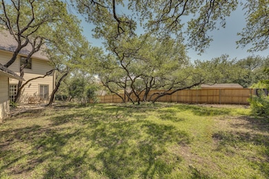 View of fenced backyard