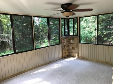 Airy screened porch is just off kitchen and is ope