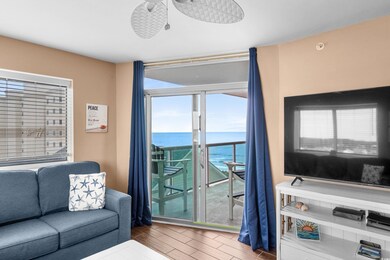 Living area featuring wood tiled floors