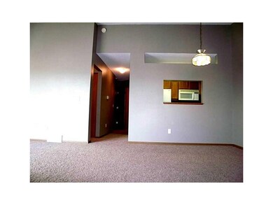 Dining Area. Pass through window to kitchen and de