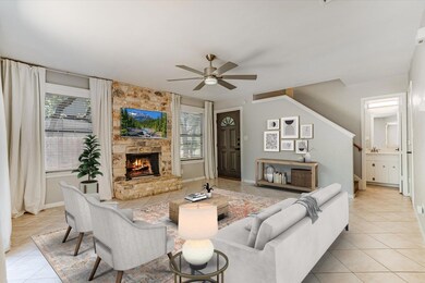 Living area featuring light tile patterned floori