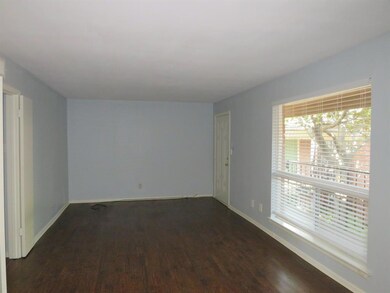 Living room with large window.