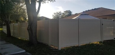 Fence surrounding rear of home.