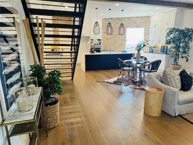 Living Dining Open space plan, hand forged steel staircase with white French oak risers.