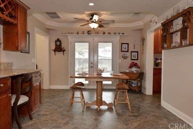 Cheerful eating area with french doors to patio
