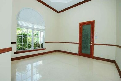Den/Office with Etched Glass Door with entrance to