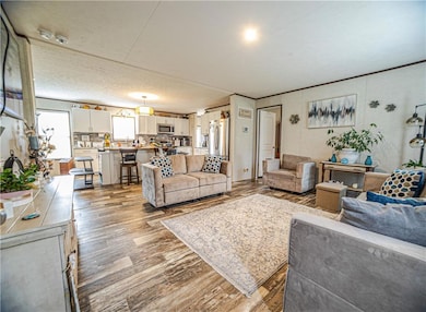 Living area featuring light wood-type flooring