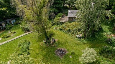 Storage sheds, walk-way from house to studio, gard