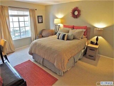 Master bedroom with tree-top views