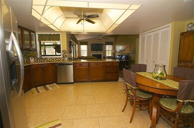 KITCHEN OVERLOOKS FAMILY ROOM