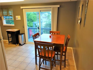 Eat in part of the kitchen.  Slider door to two ti