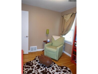 One of the two first floor bedrooms  Two windows f