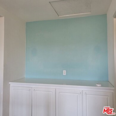 Storage top of the stairs