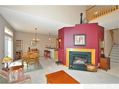 The gas fireplace in the Living Room is tucked awa