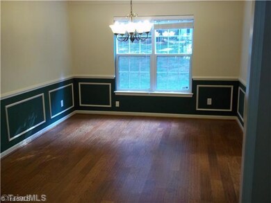 Dining Room. Large, open dining room has brand new hardwood floor!