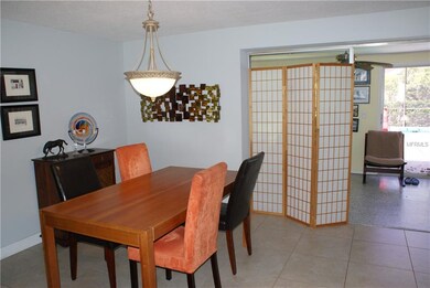 Dining room just off the living room with pocket d