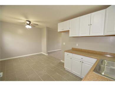 Spacious kitchen has plenty of room for your dinin