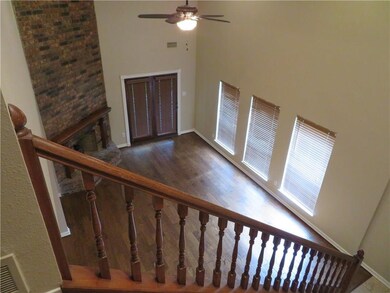 View from upstairs to living dining area below