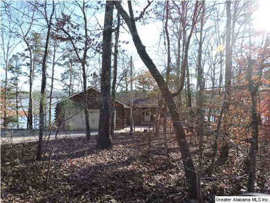 Wooded and peaceful entrance to home.
