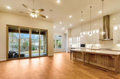 Natural finish large island with sink and addition