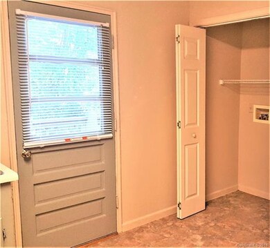 Laundry area in kitchen in both units