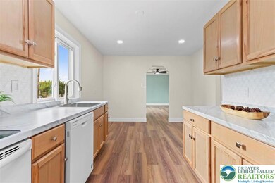 Gorgeous kitchen! Fresh and bright! new flooring,