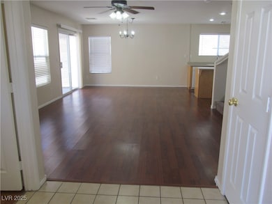 Spare room with a ceiling fan, light wood-style fl